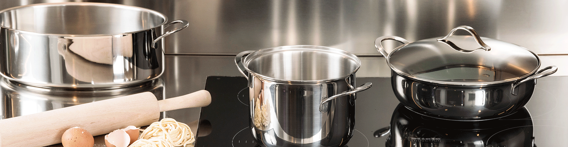 Elegant display of vases, kitchenware, and glass cups, showcasing a range of stylish and functional items to enhance your home decor and dining experience