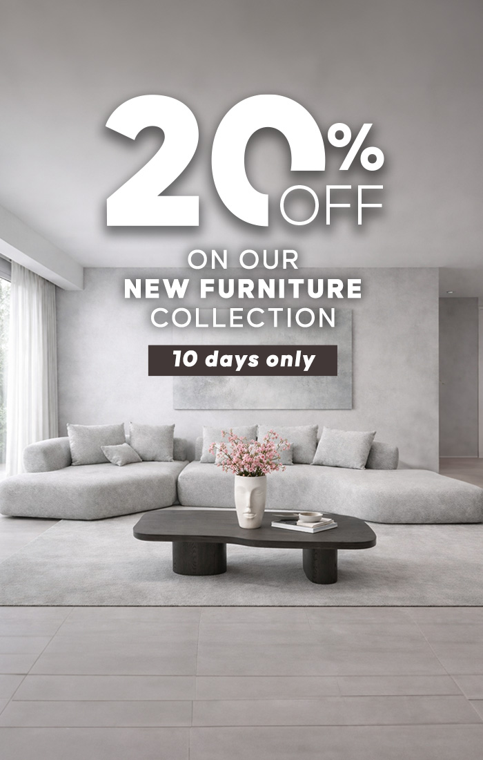 Banner showing a modern grey sectional sofa and dark coffee table.