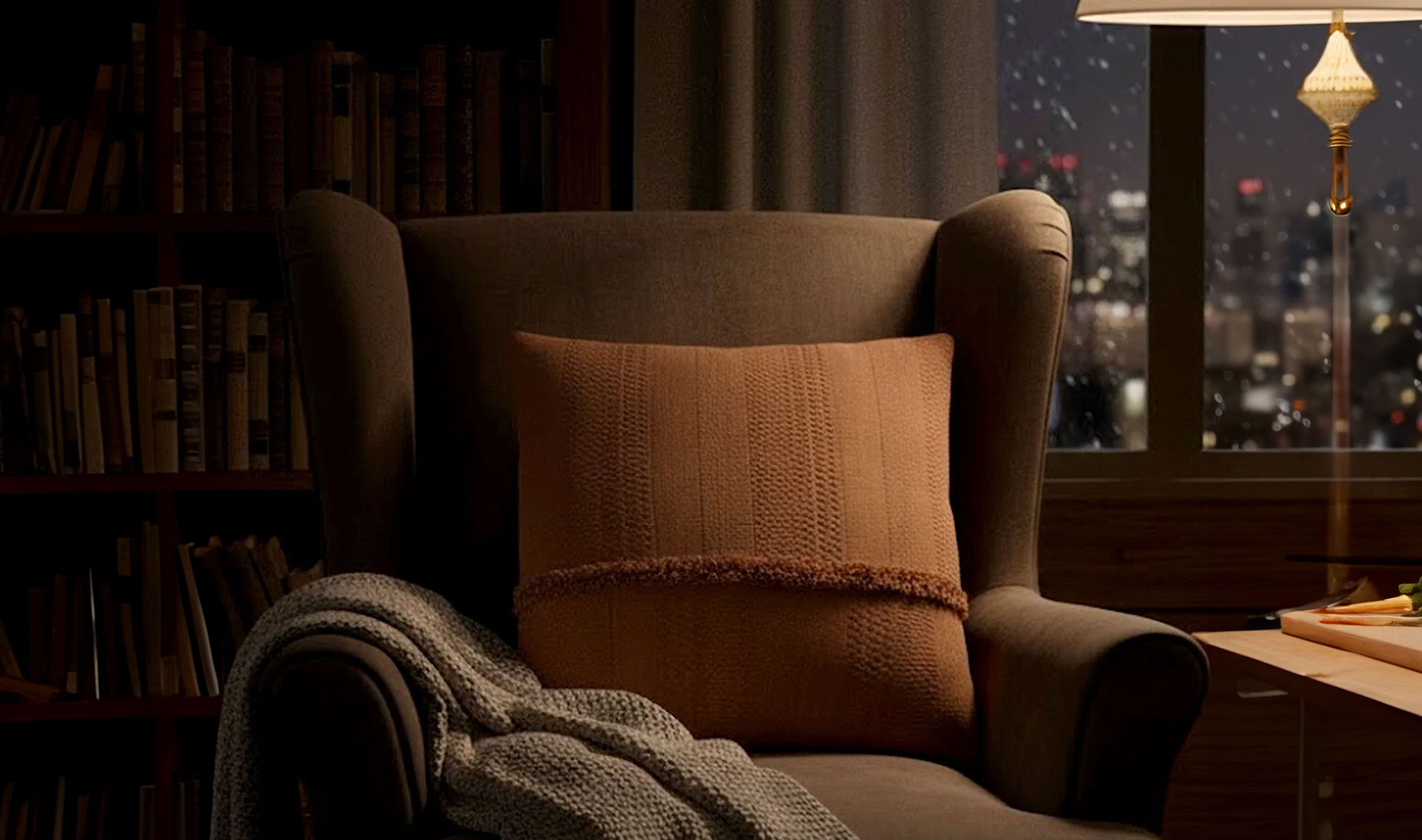 Armchair styled with cushion and throw in a cozy living space.